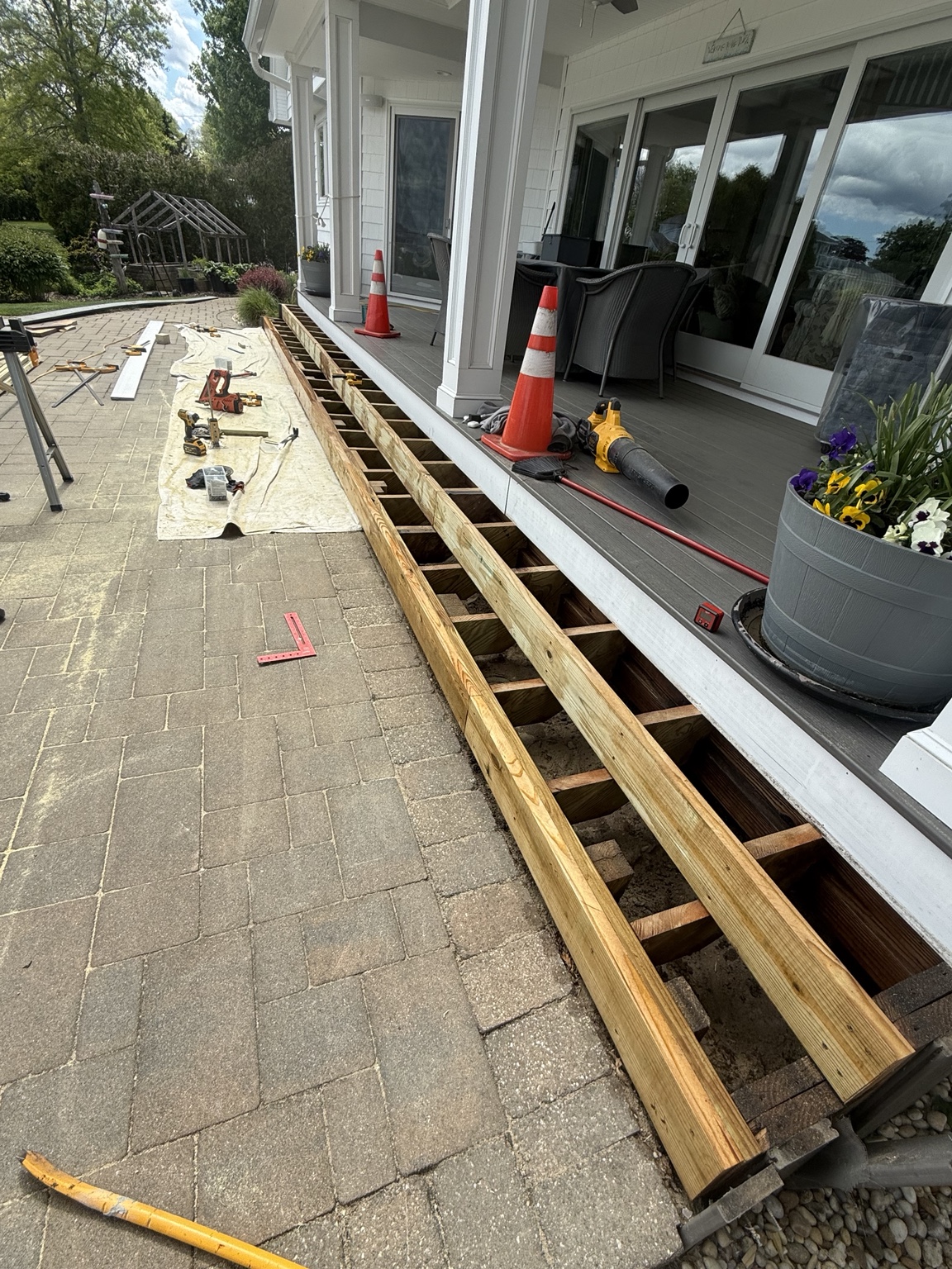 Porch framing in progress from side view