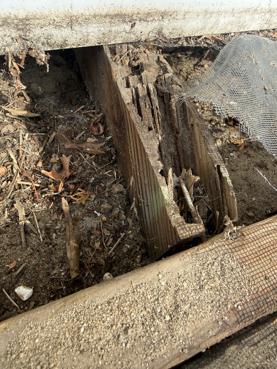 Rotten support post before repair