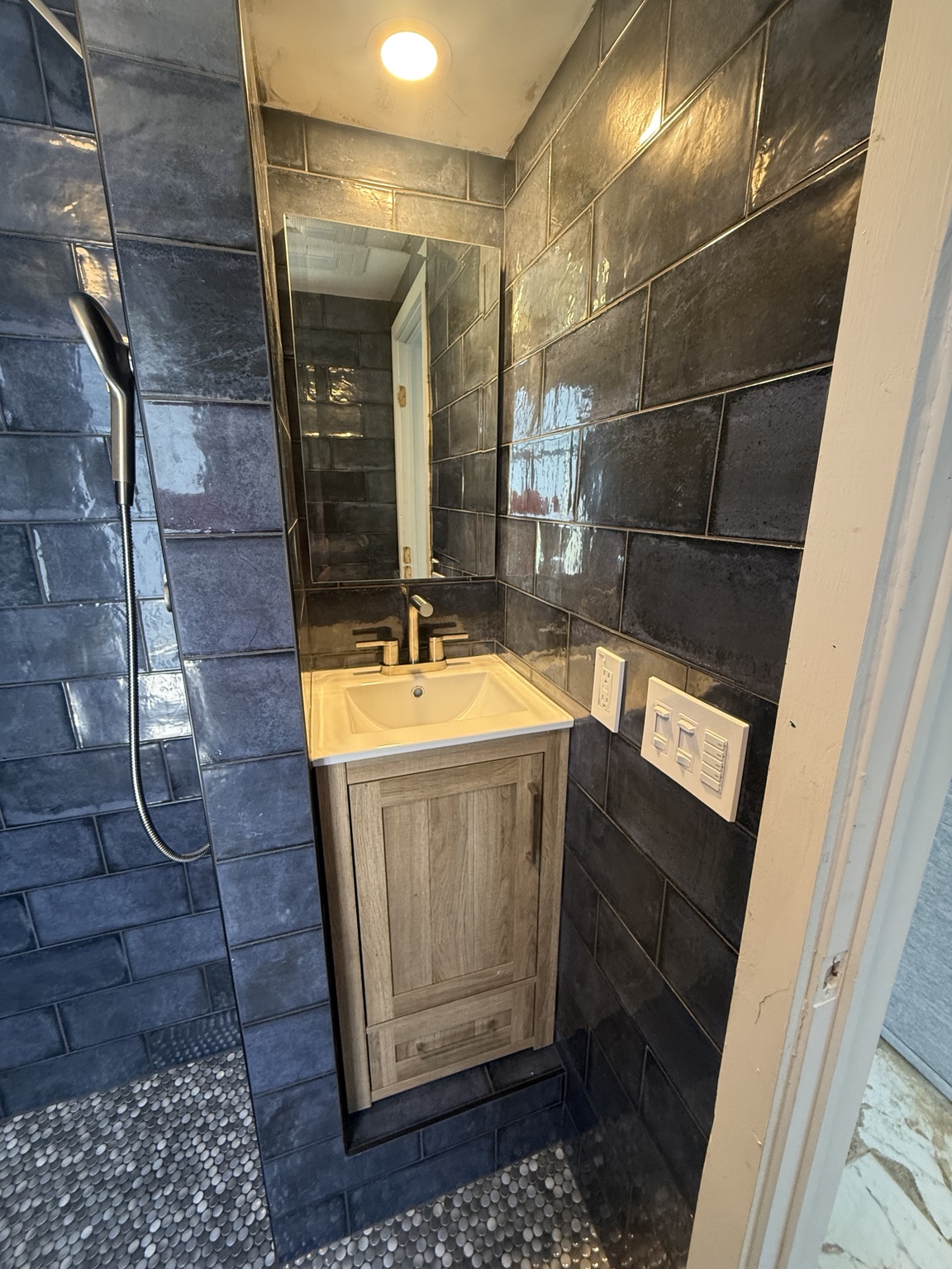 Vanity within tiled bathroom
